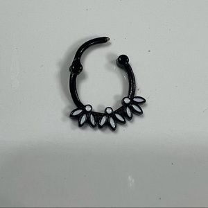 Septum hinged clicker ring